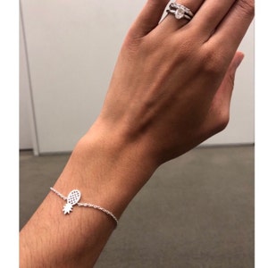 Ariana added a photo of their purchase