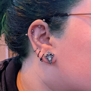 Separate industrial deals earrings