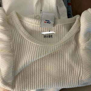 Nina added a photo of their purchase