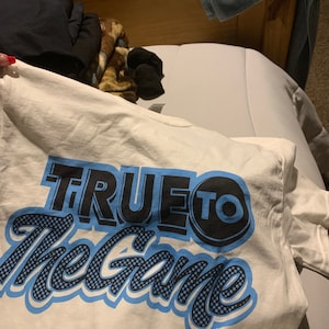 university blue jordan 9 shirt