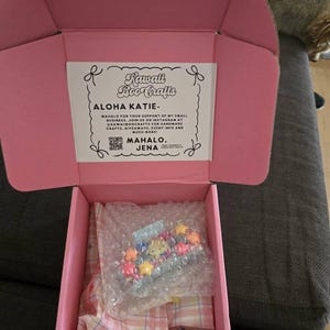 Katie added a photo of their purchase
