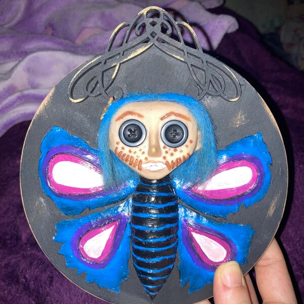 Macys christmas doll 2025