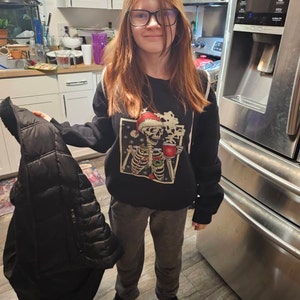 Kim added a photo of their purchase