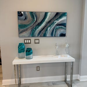Jennifer added a photo of their purchase