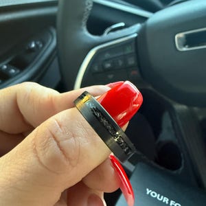 Natasha added a photo of their purchase