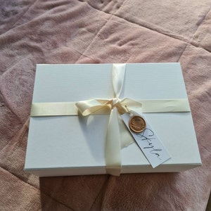 Priscilla added a photo of their purchase