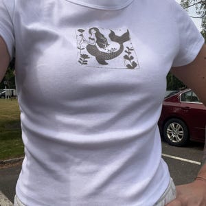 Denise added a photo of their purchase