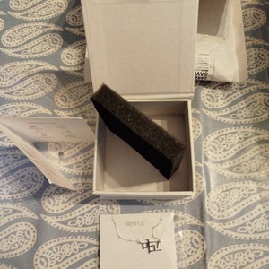 Murielle added a photo of their purchase