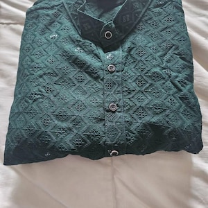 Sashi added a photo of their purchase