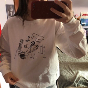 Emma added a photo of their purchase
