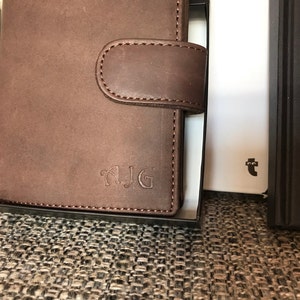 Elaine added a photo of their purchase