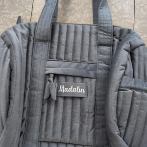Natalie added a photo of their purchase