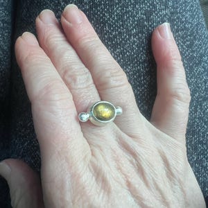 Asya added a photo of their purchase
