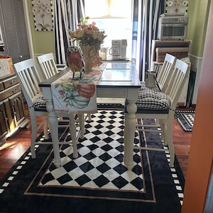 Linda DeCocq added a photo of their purchase