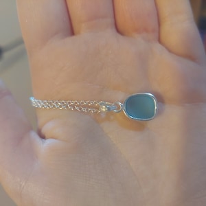 Helen added a photo of their purchase