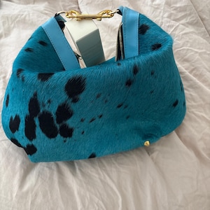 Isabella added a photo of their purchase