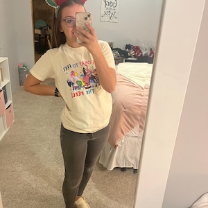 Taylor added a photo of their purchase