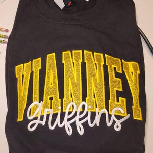 Angela added a photo of their purchase