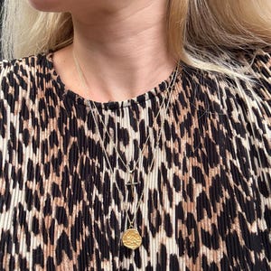 Gina added a photo of their purchase