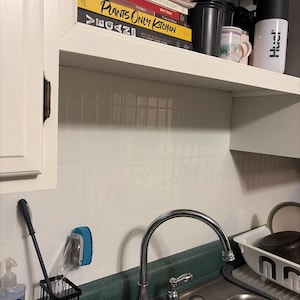 Erica added a photo of their purchase