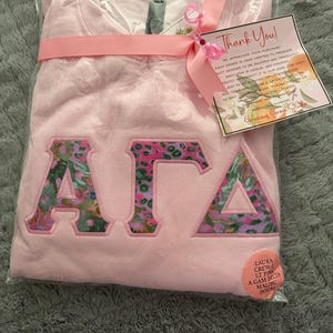 Laura added a photo of their purchase