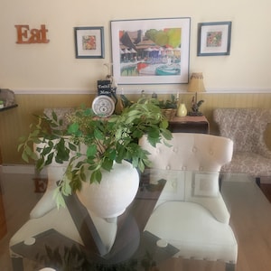 Lesley added a photo of their purchase