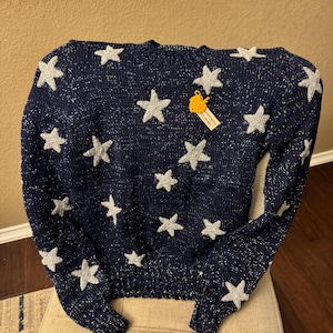 Suéter de estrellas inspirado en Coraline tejido a mano México