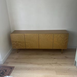 Sasha added a photo of their purchase
