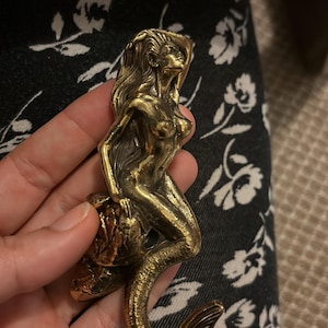 Adriana added a photo of their purchase