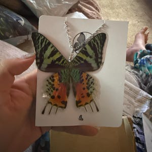 Gina added a photo of their purchase