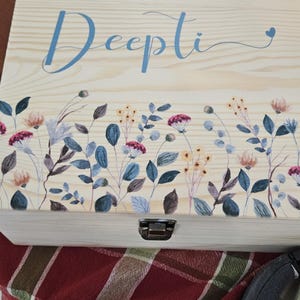 Aruna added a photo of their purchase