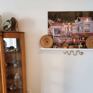 Sharon added a photo of their purchase