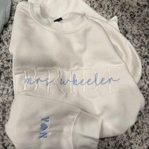 Ashleigh added a photo of their purchase
