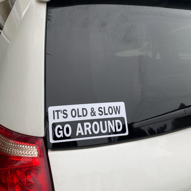 "IT'S OLD AND SLOW JUST GO AROUND" Vinyl Decal Sticker - 2.5x8 - Glossy White Oracal For Car Truck Window Bumper
