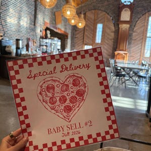 Alison added a photo of their purchase