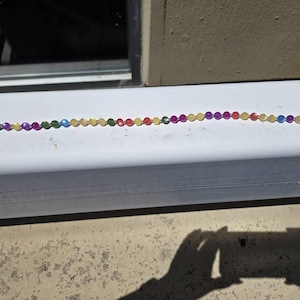 Asya added a photo of their purchase