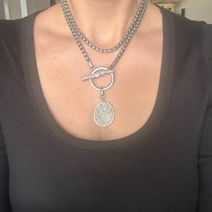Claire added a photo of their purchase
