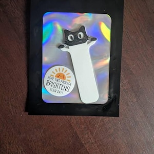 Kat added a photo of their purchase