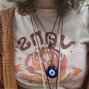 Black Enamel Evil Eye Guitar Pick Pendant main image 0