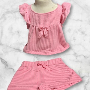 Angelica added a photo of their purchase
