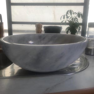 Pam added a photo of their purchase