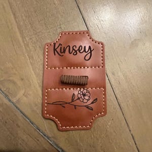 Laura added a photo of their purchase