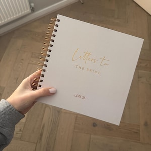 Kimberley added a photo of their purchase
