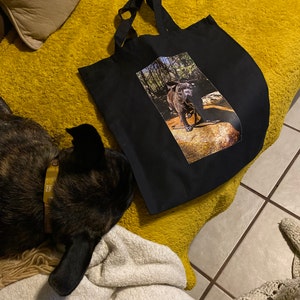 Laura added a photo of their purchase