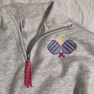 Caitlin added a photo of their purchase