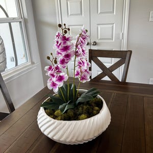 Tina added a photo of their purchase