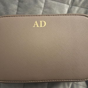 Davina added a photo of their purchase