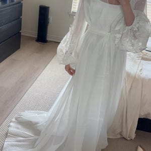 Giovanna added a photo of their purchase