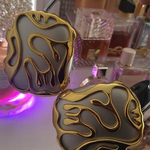 Khadija added a photo of their purchase