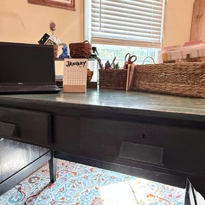 Catherine added a photo of their purchase